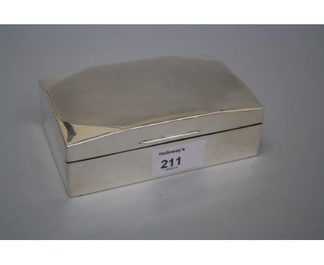 An Edwardian silver cigarette box with engine turned hinged cover and wood lined interior, Birmingham 1929, 4.5 x 13 x 8.5cms