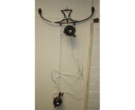 An Art Nouveau Benson type brass rise and fall twin branch ceiling lamp