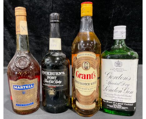 A bottle of Grant's Scotch whisky, 75cl; others, Cockburn's Port; Martell fine Cognac; Gordon's gin (4) 