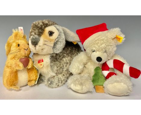 A Steiff rabbit, Dossy; a Steiff mohair Squirrel Nutkin, number 01292; a Steiff Christmas Bear (3) 