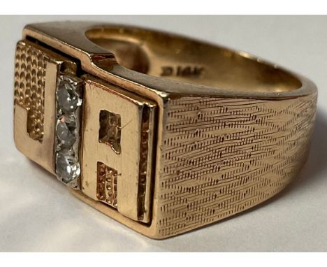 A 14k gold signet ring, set with three diamond chips, initialed JA, size O/P, marled 14k, 11.8g 