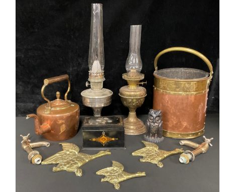 An Arts and Crafts copper cylindrical coal bucket, brass mounted, riveted swing handle; a Victorian copper kettle, acorn knop