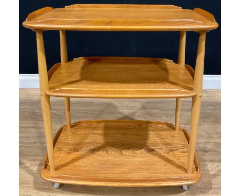 An Ercol beech and elm three tier trolley, 76.5cm high, 71.5cm wide, 46cm deep 