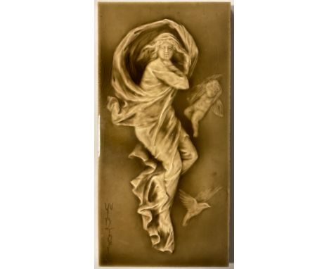 Ceramics - an Art Nouveau tile, lady with dove and putto, entitled ‘Winter’, 30cm x 15cm 