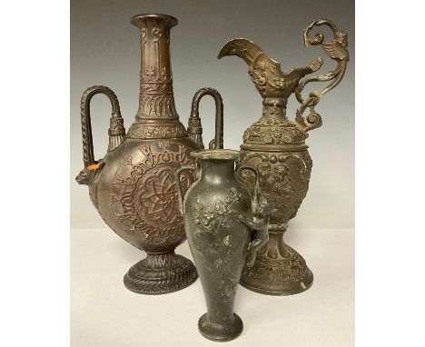 A late 19th century terracotta two handled moon flask type vase, the central cartouche reticulated with curled dragon moulded