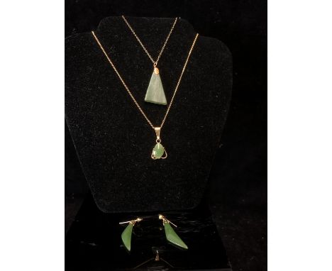 Two New Zealand Nephrite jade pendants; and a pair of earrings, in Arahura , New Zealand box (5) 