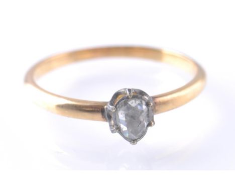 A 19th century antique rose gold single stone diamond solitaire ring. The&nbsp; marquise cut diamond approx .20pnts within mo