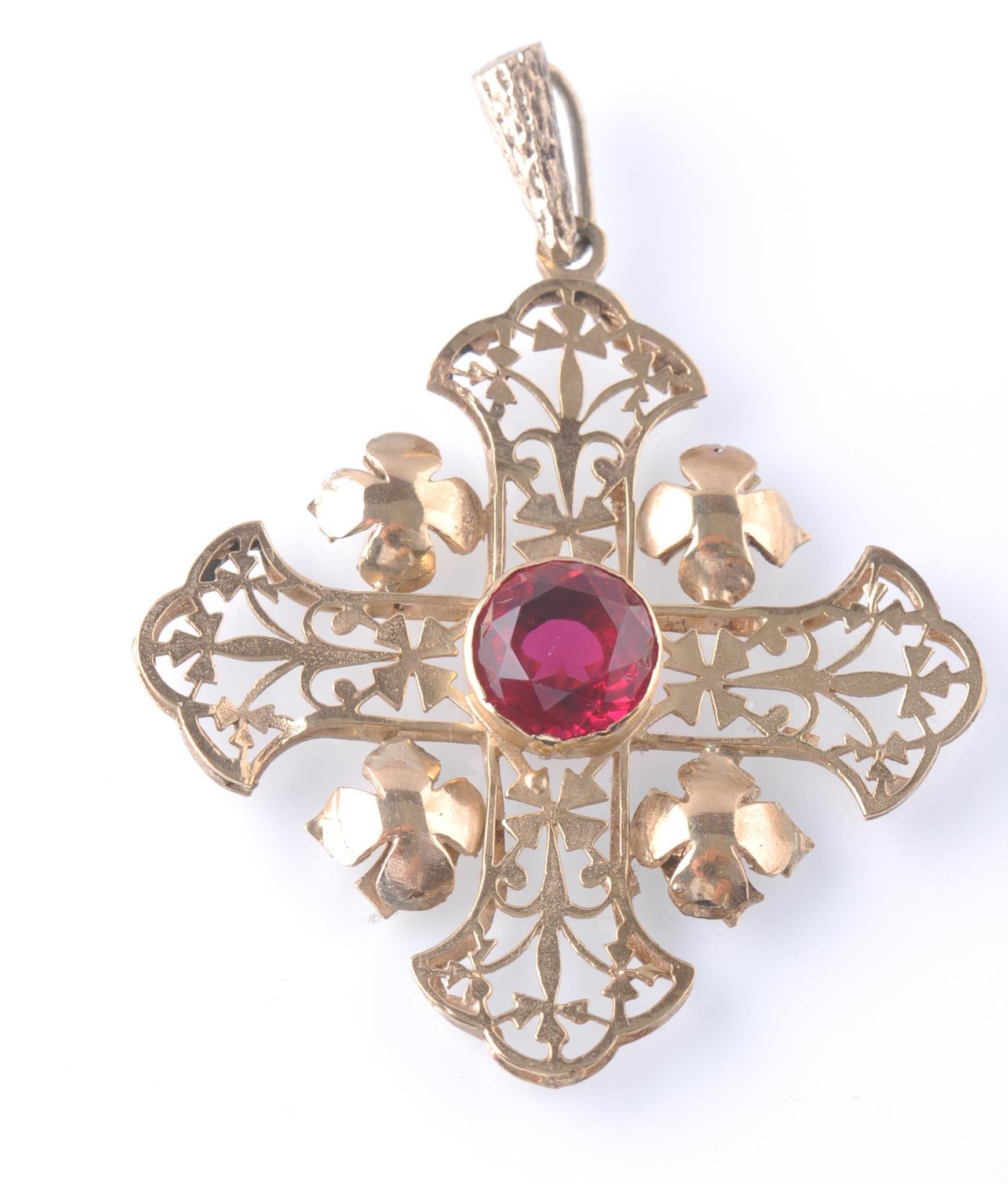 A 9ct Gold Gem Set Crucifix Pendant The Openwork Pendant Having Central Collet Set Red Gem Strun 6162