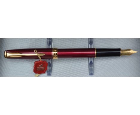 A parker Sonnet Fountain pen, laque ruby red GT, uninked and in original packaging