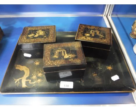 A JAPANESE LACQUER TRAY and three lacquered boxes containing an assortment of mother-of-pearl counters