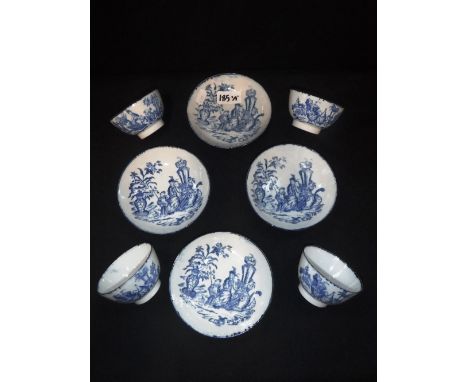 A SET OF FOUR BLUE AND WHITE TEA BOWLS AND SAUCERS decorated with Oriental style figures seated amongst vases and flowers