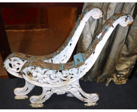A PAIR OF VICTORIAN CAST IRON BENCH ENDS