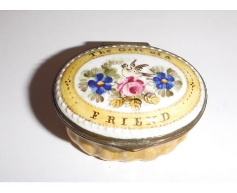 AN ENAMELLED PATCH BOX, the lid decorated with flowers 'The Gift of a Friend'