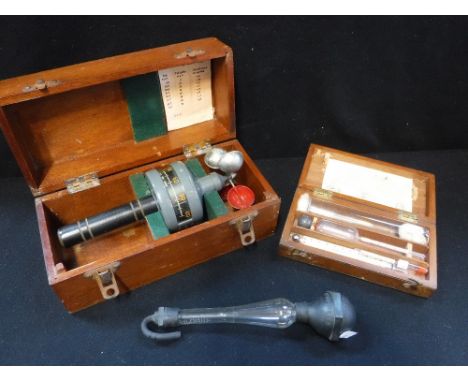 A CASED HAND ANEMOMETER, a 19th century milk tester and another instrument