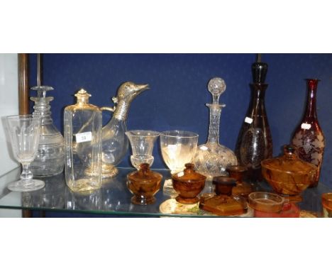 A REGENCY STYLE DECANTER with gilt decoration, a claret jug, in the form of a duck, with plated mounts and similar glassware
