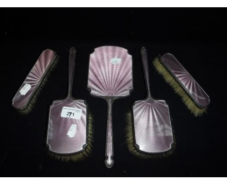 A FIVE PIECE SILVER AND PINK GUILLOCHE ENAMEL DRESSING TABLE SET