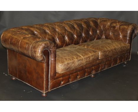 A modern Coach House Antiques brown leather Chesterfield sofa  CONDITION REPORTS Dimensions approx : Width 220 cm, Depth (fro