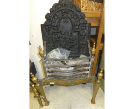 A Regency style iron and brass fire basket with cast iron back inscribed "1697", together with a set of chain measures