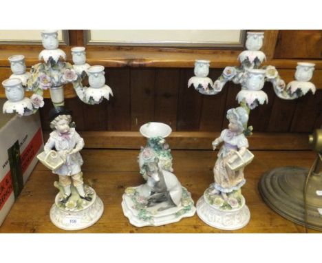 A pair of Dresden porcelain figural candelabra, together with a Dresden porcelain vase decorated with a whippet CONDITION REP