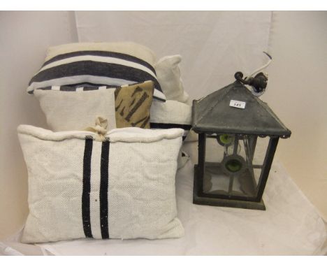 An early 20th Century copper and leaded glazed porch light and a set of cream ground and black striped cushions