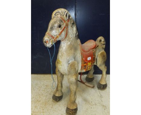 A vintage Mobo enamelled metal walking steering toy horse, together with a box containing a collection of "The Works of Charl