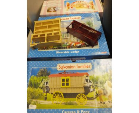 Two boxed Sylvanian Families children's toys, together with an Angelina Ballerina play set and a small quantity of doll's hou