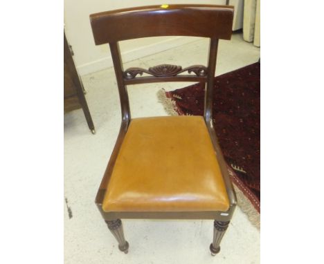A set of six mahogany William IV style chairs with light orange leatherette upholstered seats