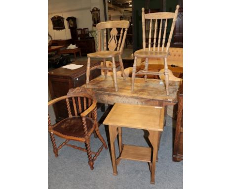 A carved horseshoe-backed occasional chair, together with two pine country chairs and a pine occasional table with shelf stre