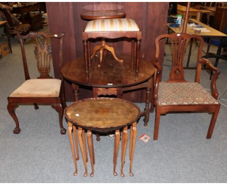 A George III style dining chair, a nest of three walnut tables, an 18th century oak drop leaf dining table, a George III armc