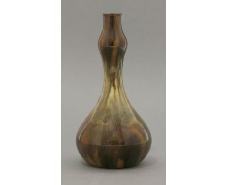 A Linthorpe Pottery vase, of double gourd shape in mottled brown and green trailed glazes, impressed shape no. 189, Ch Dresse