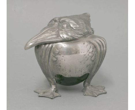 A pewter 'Grotesque Bird' inkwell,  with a pottery well, raised on three claw feet,  10.5cm high