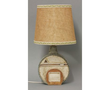 A Troika pottery lamp base,  by Colin Carbis, of wheel form, with geometric panels in three colours, inscribed with artist's 
