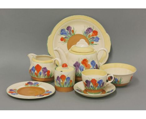 A Royal Staffordshire Clarice Cliff Honey Glaze 'Spring Crocus' tea set, comprising: six cups,  six saucers,  six side plates