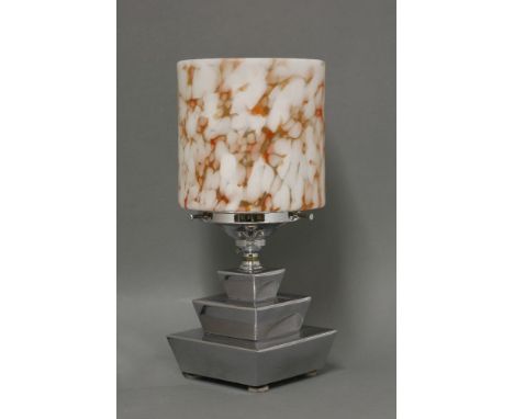 A Walkerlite table lamp, with a mottled cylindrical shade, raised on a stepped stand, 33cm high