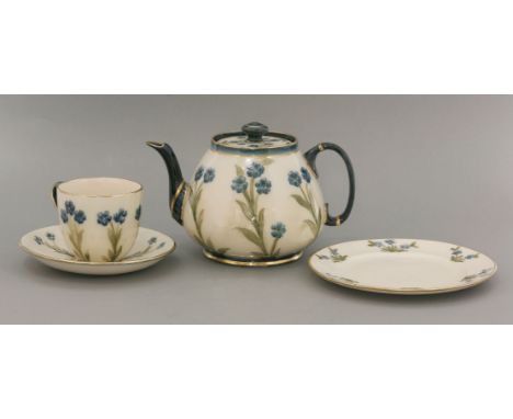 A James Macintyre 'Forget-me-not' part teaset, pattern no. 2830, comprising: a teapot and cover, six tea cups, six saucers, f
