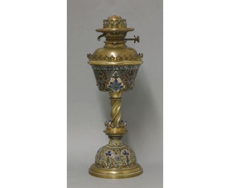 A Doulton Lambeth stoneware and brass-mounted oil lamp, the incised well and domed base centred on a spiral twist column, wit