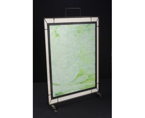 Mottled glass firescreen, with green and white glass panels housed in a metal frame, 45.5cm wide by 69cm high