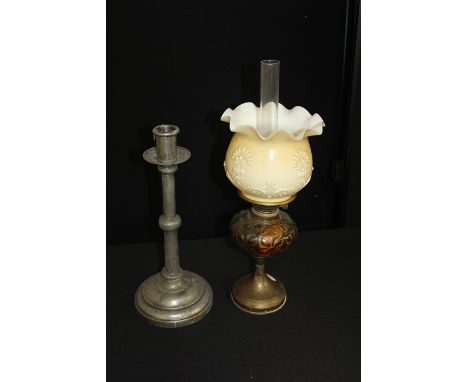 Oil lamp, with frosted glass shade, orange glass reservoir, raised on a brass foot, Kenneth Turner pewter candlestick (2)