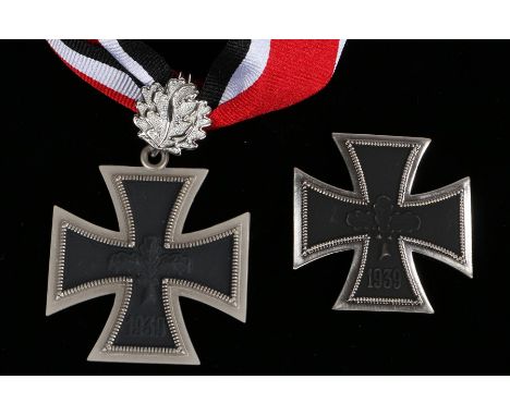 West German 1957 version of the 1939 Knights Cross of the Iron Cross with Oakleaves, together with a 1957 version of the 1939