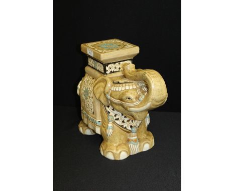 Porcelain jardiniere stand, depicting an elephant with trunk raised, 31cm high