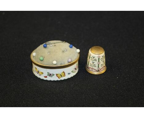 Halcyon Days Enamels pin cushion, together with a Halcyon Days thimble, (2)