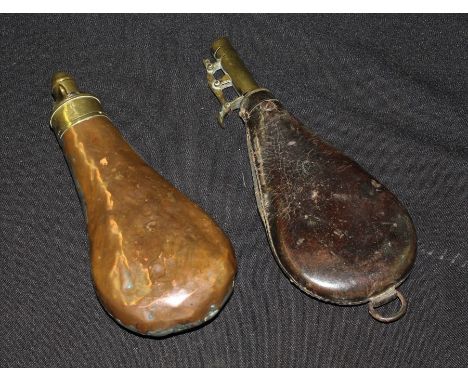 Copper and brass powder flask, leather and brass shot flask with raised horse and dog decoration (2)