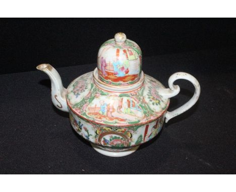 Chinese Canton enamel teapot, with a high cover above the foliate and figural decorated pot, 21cm high