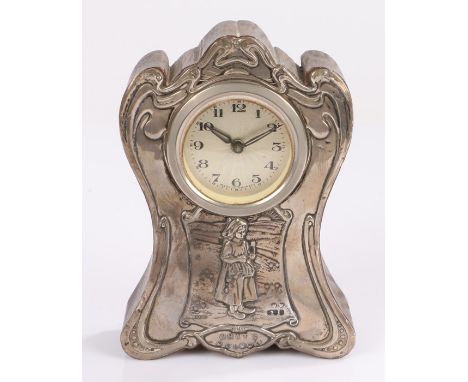 Early 20th Century silver mounted mantel clock, London marks rubbed, the Art Nouveau style case with central depiction of a y