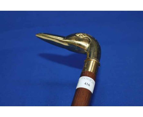 GENTLEMAN'S WALKING STICK
the brass handle modelled as a duck's head, unscrewing to reveal a flask