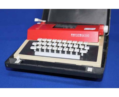 PETITE INTERNATIONAL TYPEWRITER
with its original case