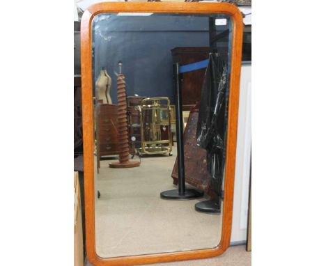 LARGE OAK FRAMED MIRROR
along with an African carved wooden elephant wall-mounting coat rack (2)