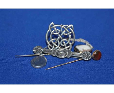 SCOTTISH SILVER CELTIC DESIGN BROOCH,
another silver brooch, two unmarked gold stick pins and a silver locket