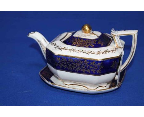 EARLY 19TH CENTURY SPODE FELSPAR PORCELAIN TEA POT AND TWO CUPS
pattern number '2721' with blue and foliate gilt decoration b