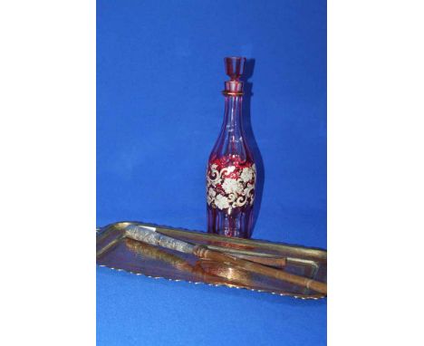 INDIAN BRASS TRAY, CHINESE SILVER PARASOL HOLDER AND A CRANBERRY CUT GLASS DECANTER (3)